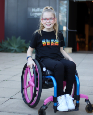 Image shows Emily Prior who is 12 in a wheelchair