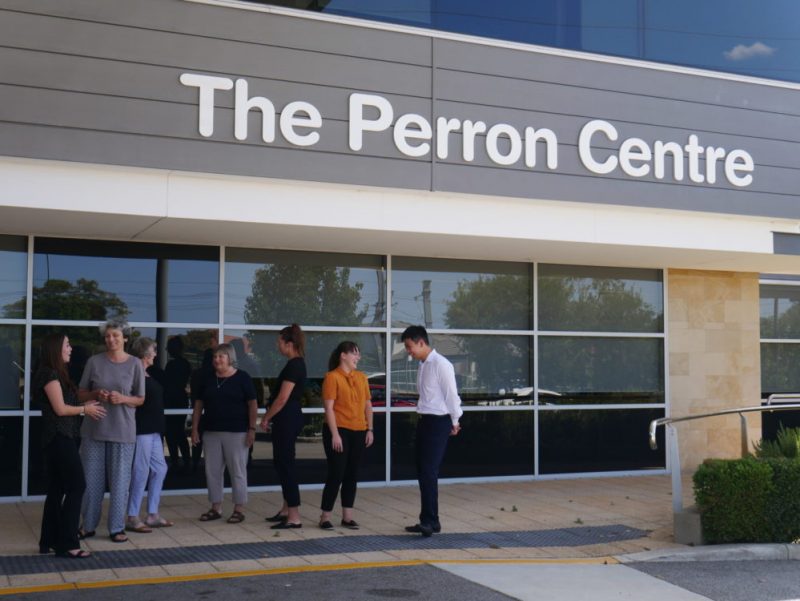 Image of people chatting with each other in front of the Perron Community Centre