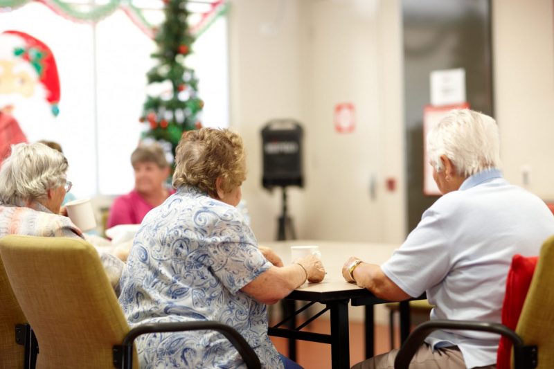 Image of a group of ladies sitting in the VisAbility CAC room